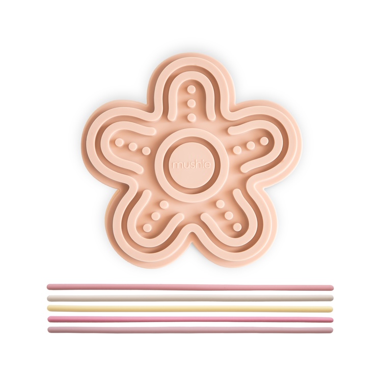 Mushie sensorisch speelgoed bloem pastel